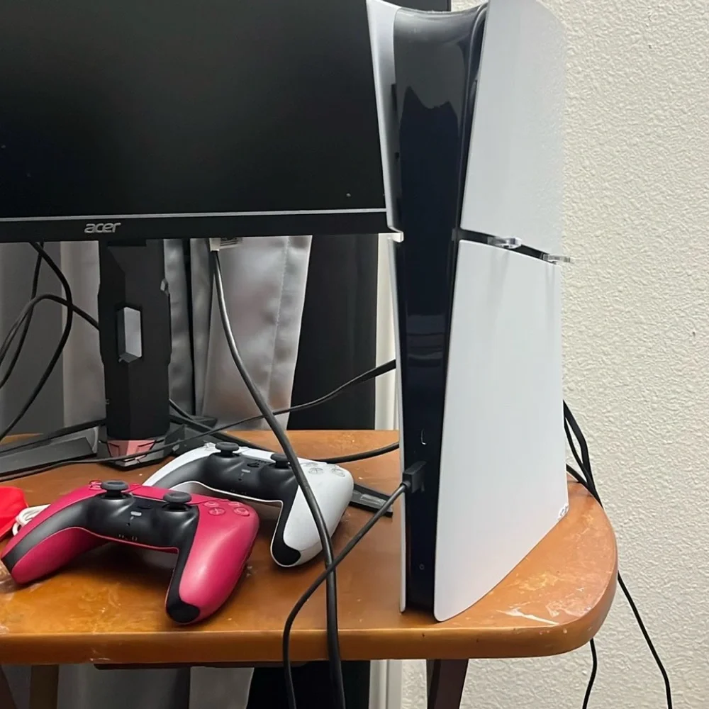 White and Black Gaming Console with Controllers